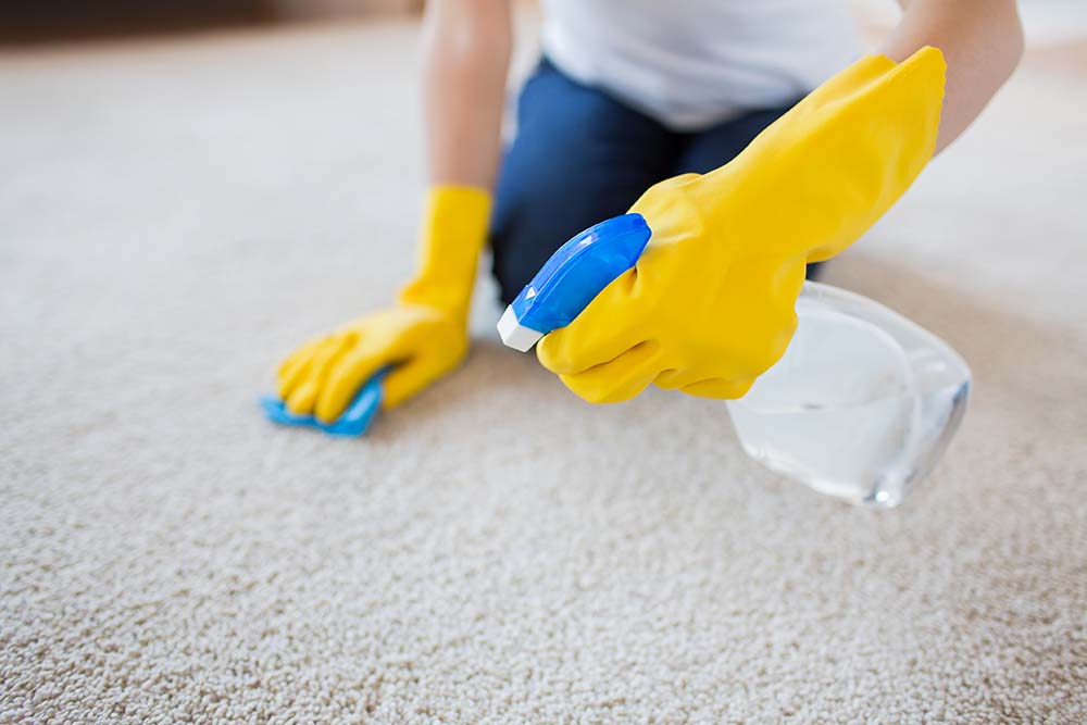 Remove greasy stains on carpet with baking soda