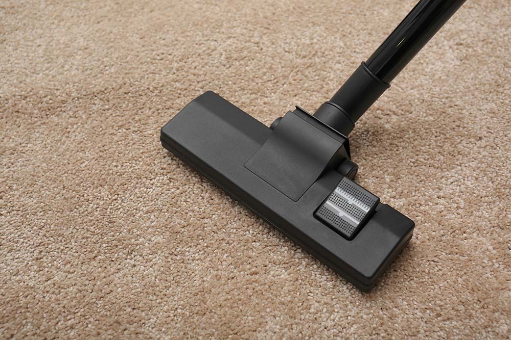 Vacuum carpet after baking soda